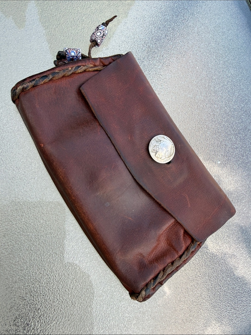 Vintage Handmade Brown Leather Clutch Wallet with Indian Head Nickel closures.